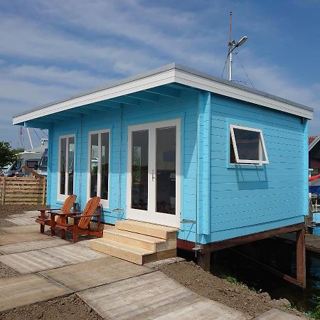Waterhuisjes Op De Pier Van Lauwersmeerplezier! Lauwersoog Kültér fotó